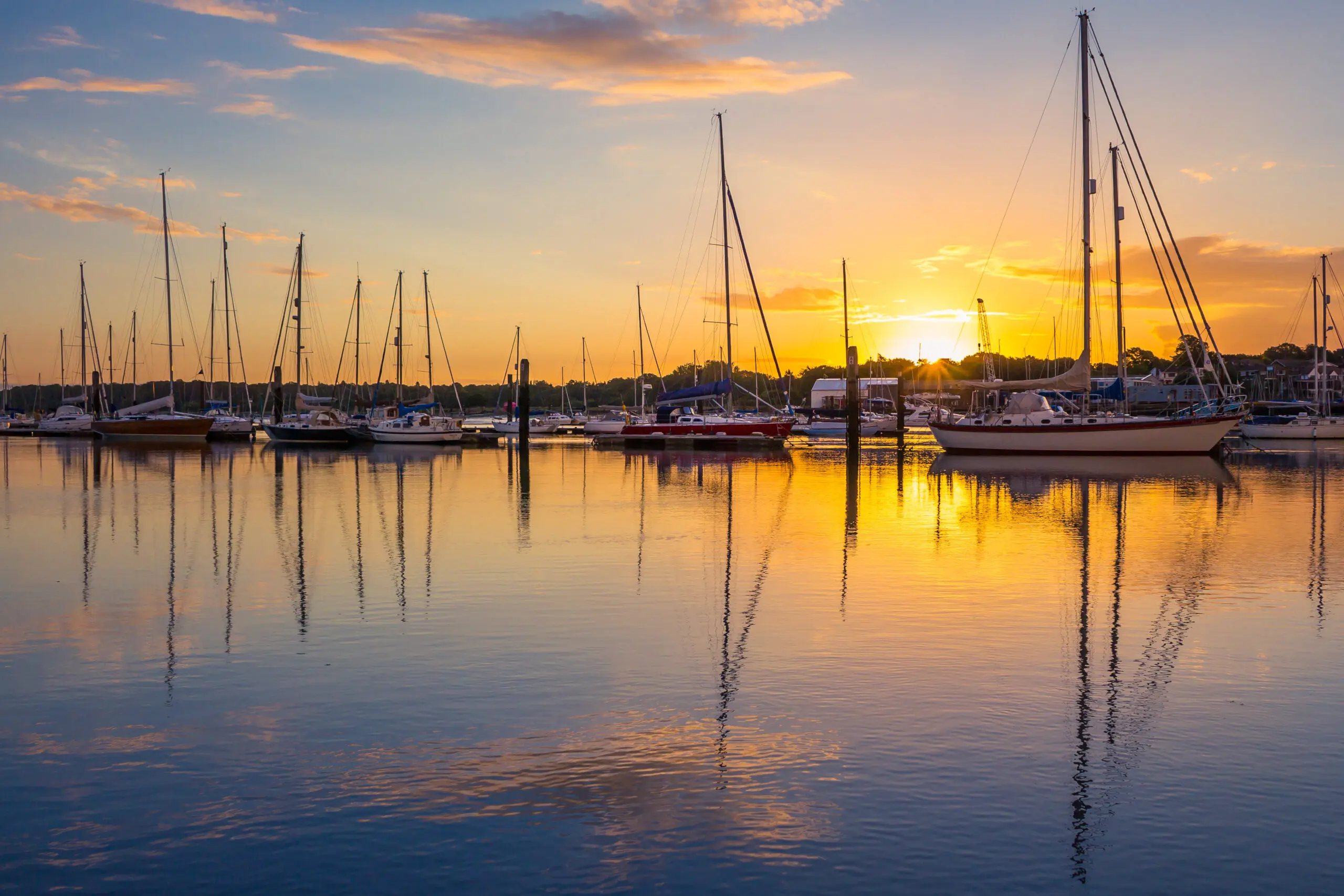 Picture of a sunset over a port in Southampton where we provide Pat Testing