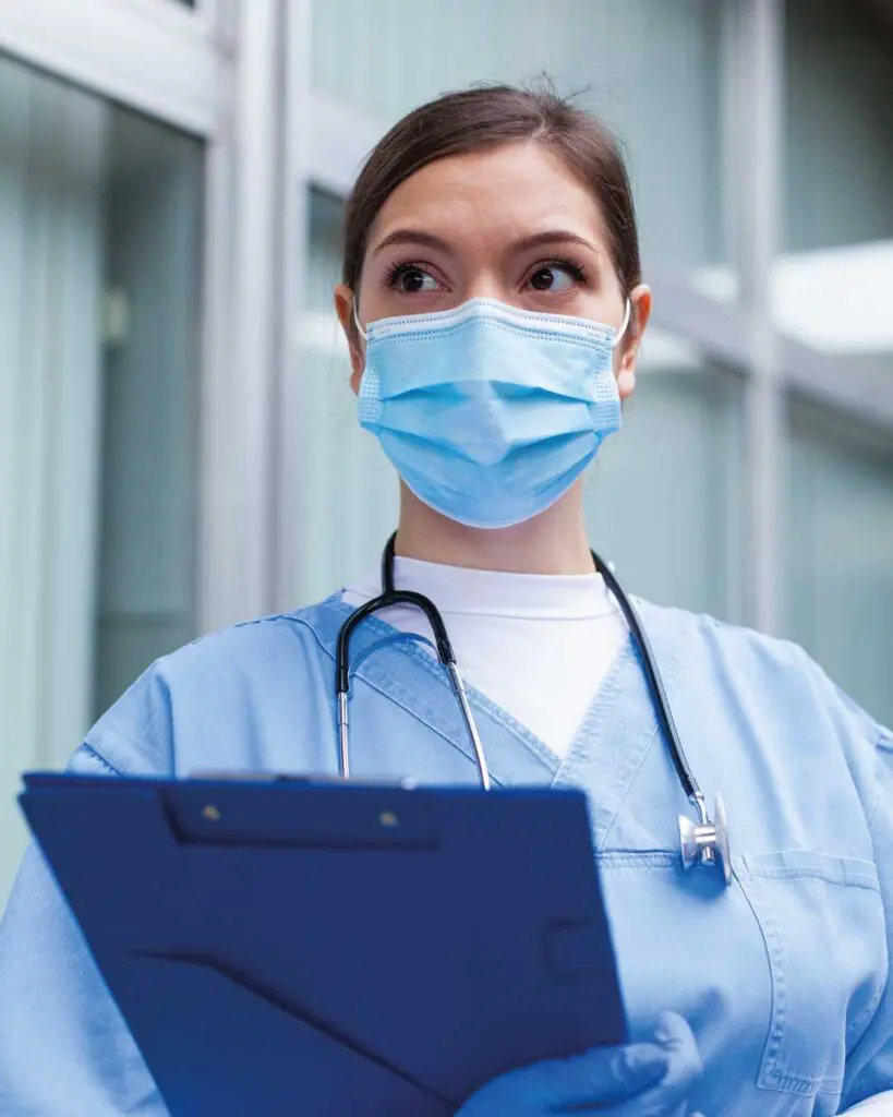 Female nurse wearing a face covering mask